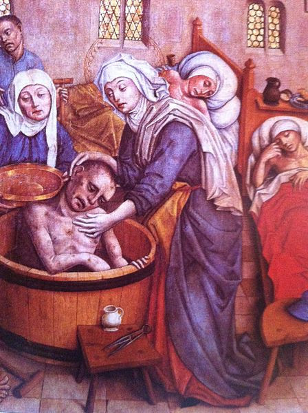 Erzsébet leprás beteget fürdet (ábrázolás a kassai Szent Erzsébet-dóm 15. századi szárnyasoltárán)